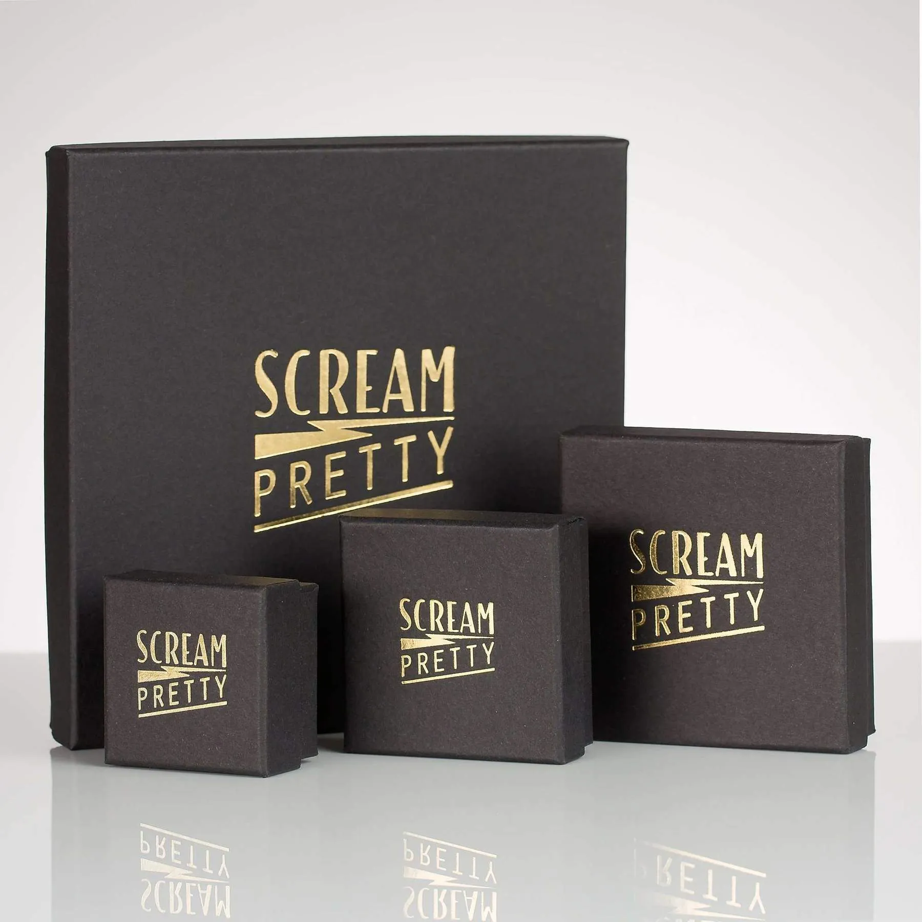 Double Drop Starburst Earrings by Scream Pretty
