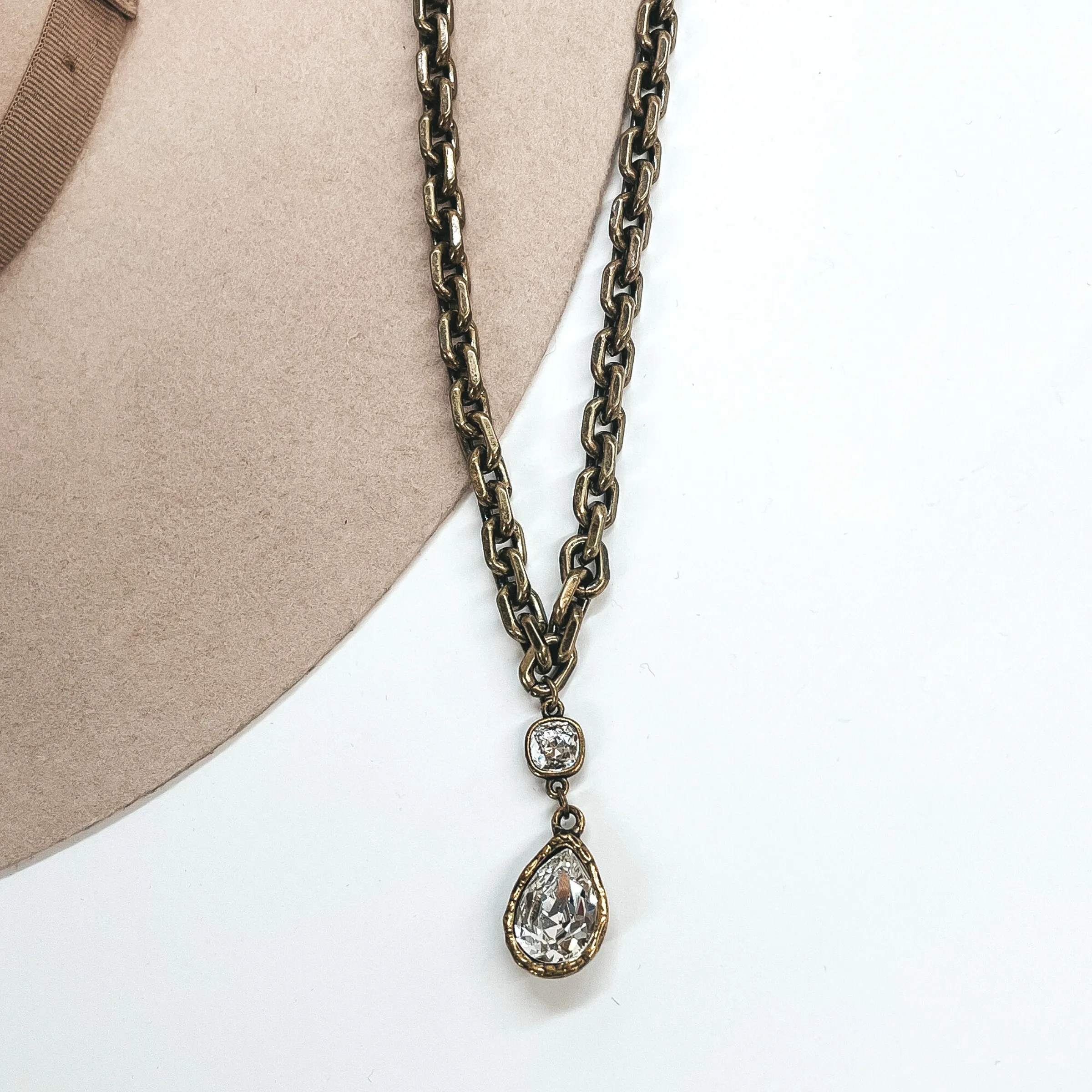 Pink Panache | Chunky Chain Necklace with Clear Crystal Teardrop and Small Clear Cushion Cut Crystal in Bronze