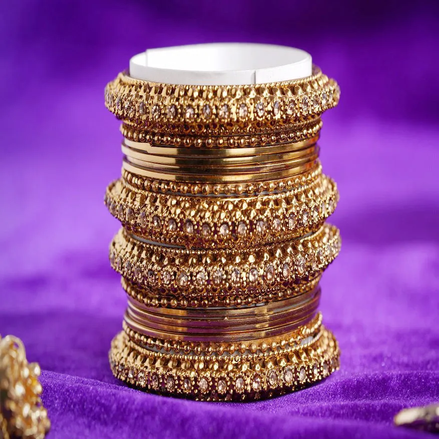 Set of 16 Golden Metal Bangle Set by Leshya